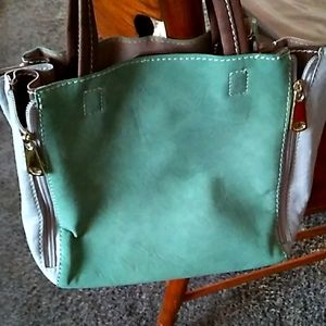 Gree/tan handbag
